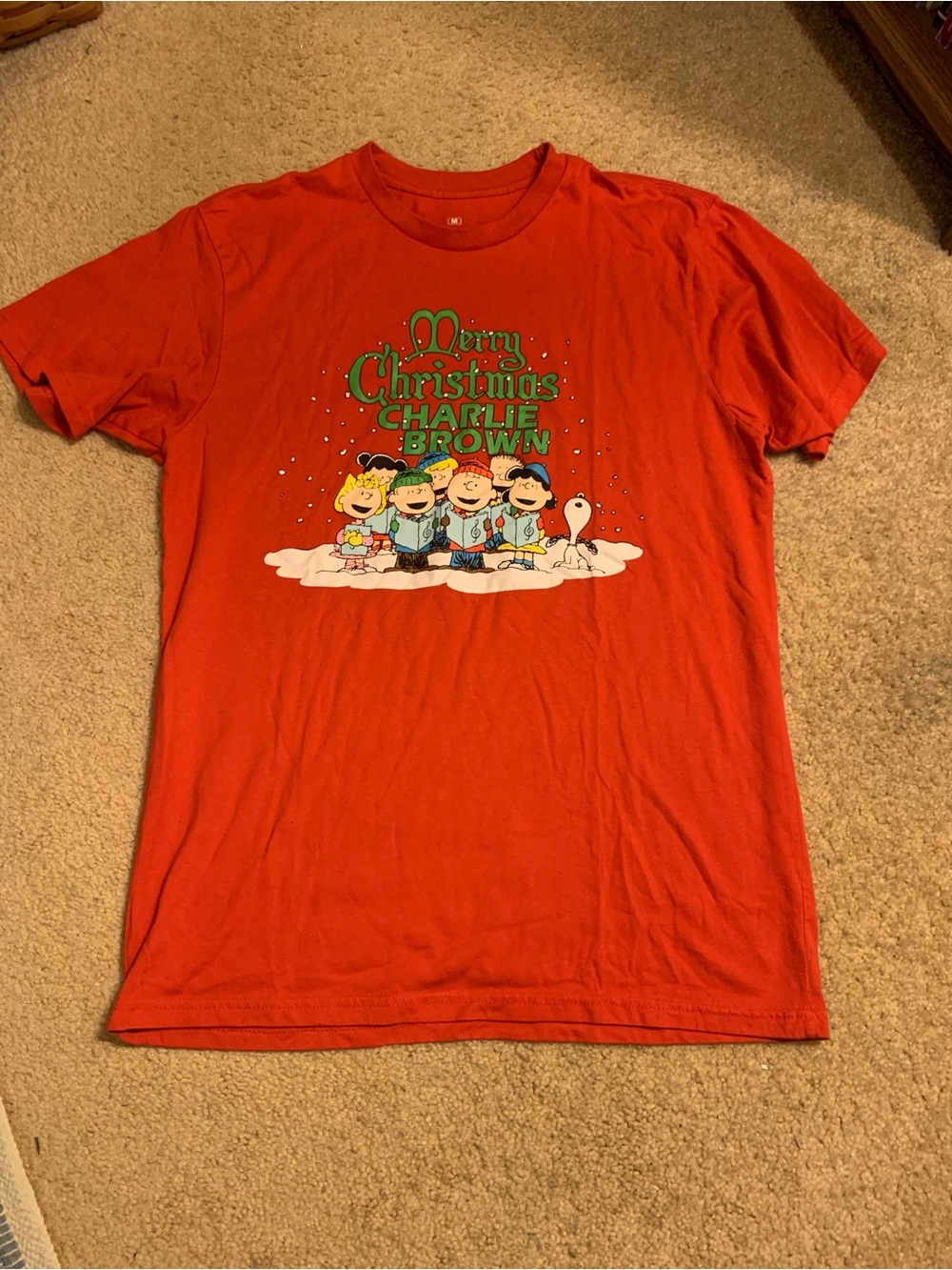 Red "Merry Christmas Charlie Brown" woman’s Graphic Tee